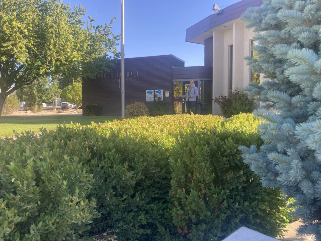 Right next to the big park in town. 